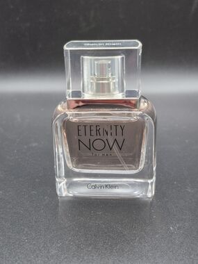Calvin Klein Eternity Now for Men - Clear Glass Bottle with Pale Amber Liquid